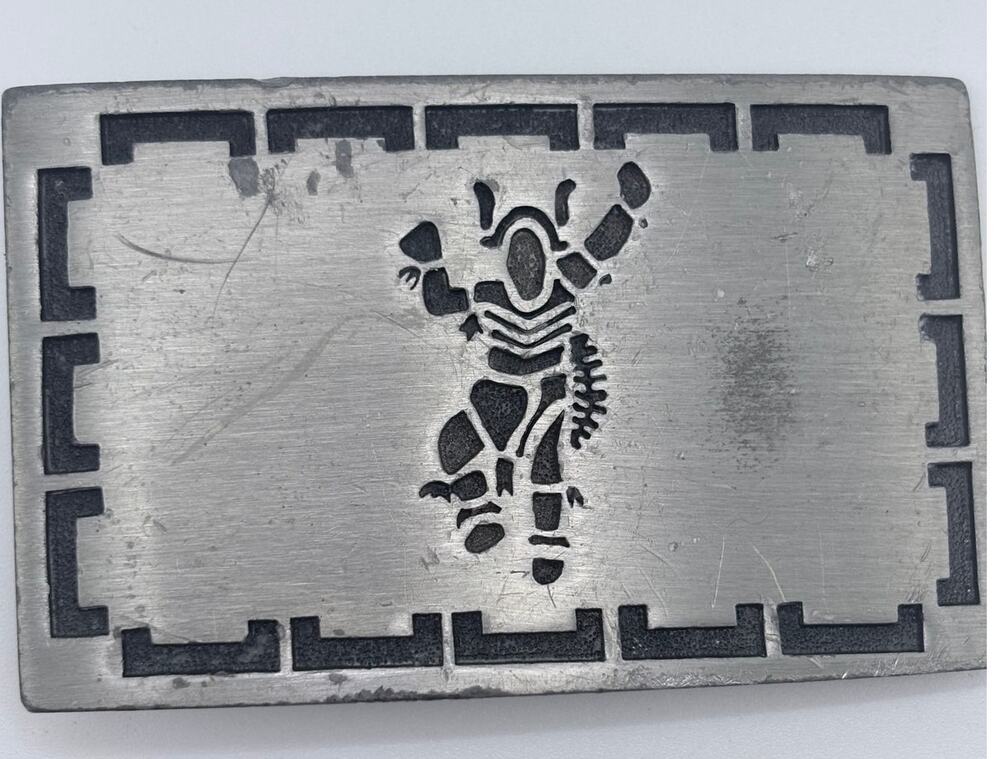 Kokopeli belt buckle in silver-tone with black details